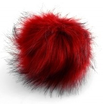 Zdjęcie pompona futrzanego w kolorze czerwonym.