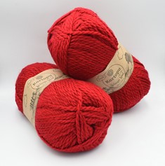 Zdjęcie włóczki Kartopu Melange Wool czerwonej.