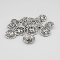 Zdjęcie guzików metalowych w kolorze srebrnym.