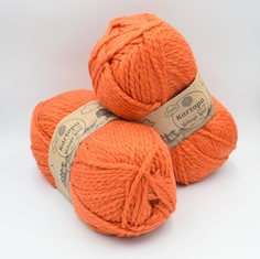 Zdjęcie włóczki Kartopu Melange Wool pomarańczowej. 