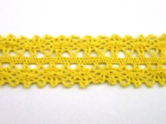 Zdjęcie koronki bawełnianej żółtej.